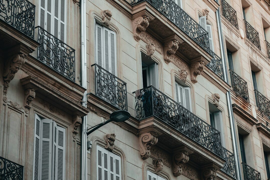 Classic Belgian building facade with large windows